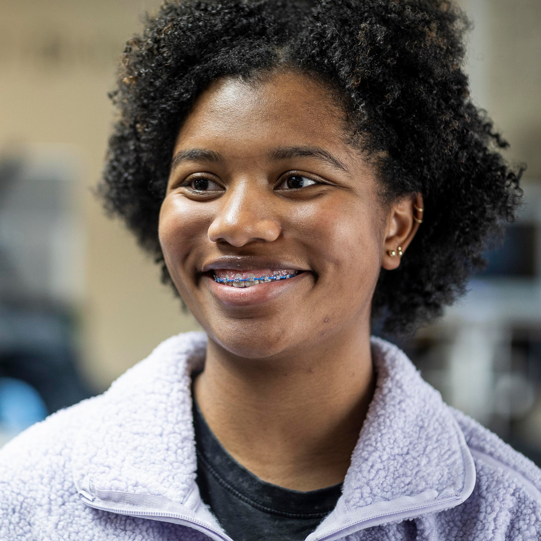 Kohrs-Orthodontics-Bad-Bite Kohrs Orthodontics patient with a bit bite being treated with braces smiling