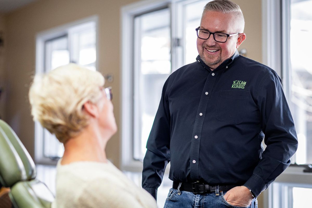 Adult patient consulting with orthodontic specialist at Kohrs Orthodontics in Aurora, Bennett, Strasburg, Colorado