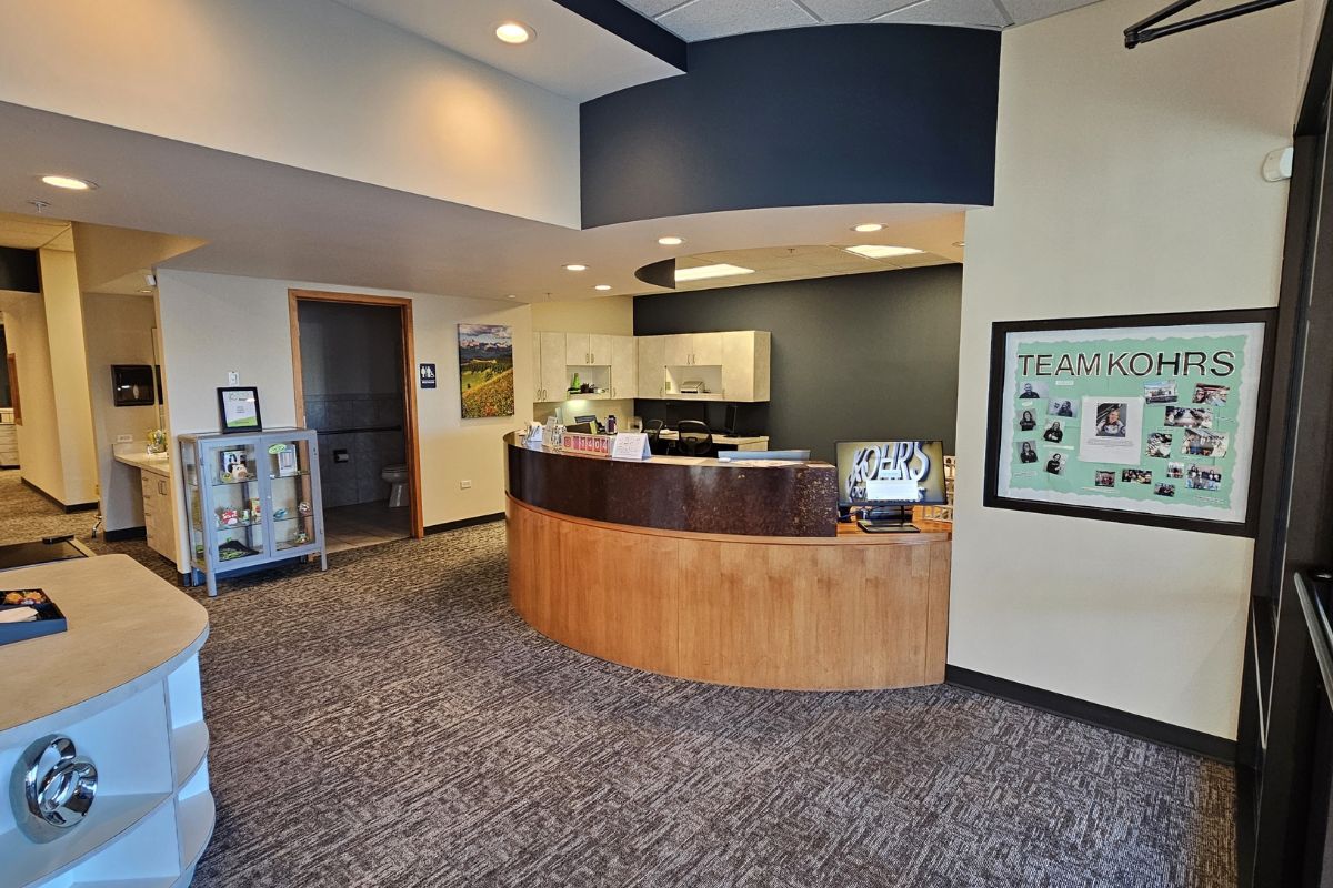 Front lobby and reception desk at Kohrs Orthodontics near Heather Gardens, Colorado showcasing a modern orthodontic office