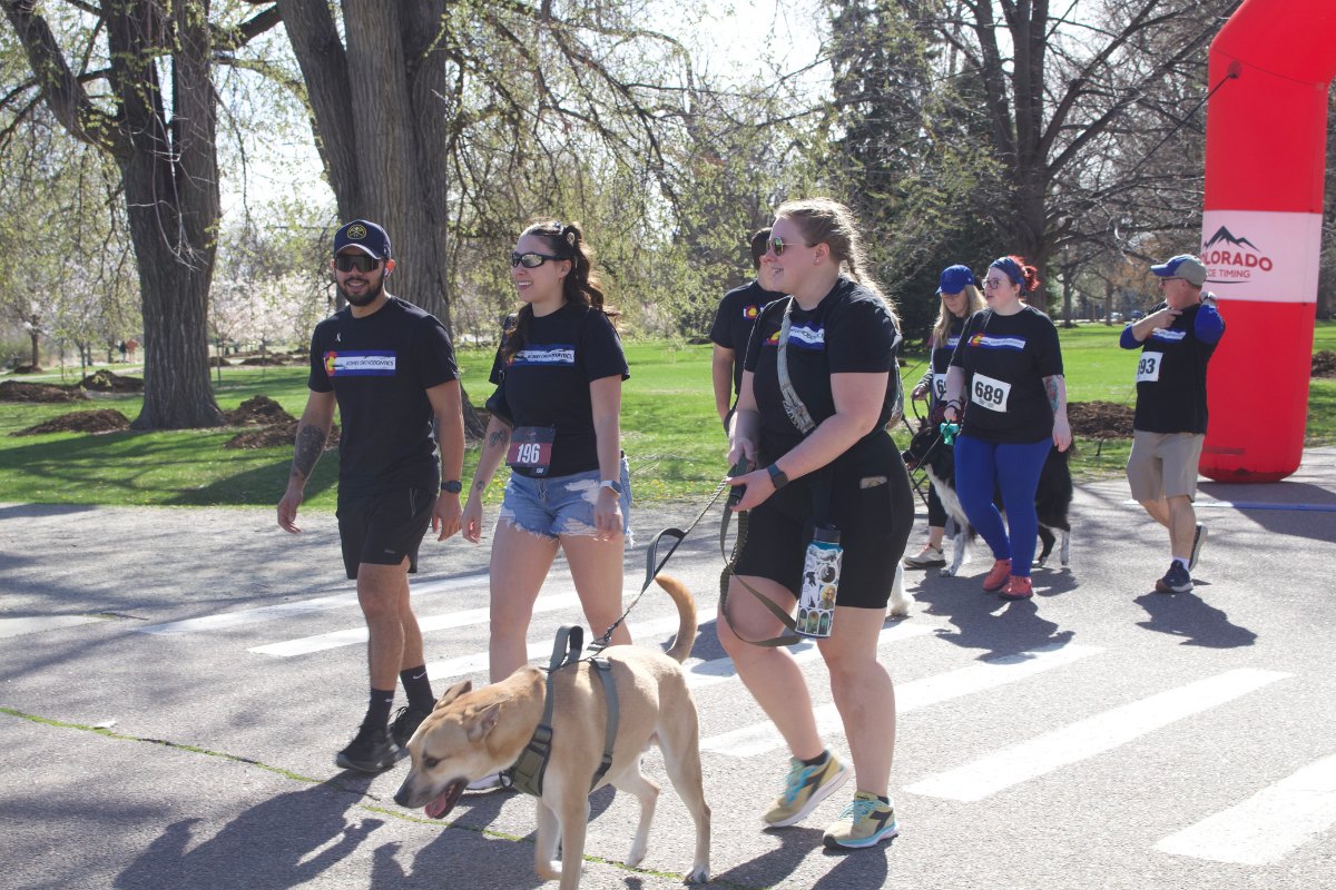 People walking outdoors near Heather Gardens, Colorado close to Kohrs Orthodontics offering expert, top-rated orthodontic care