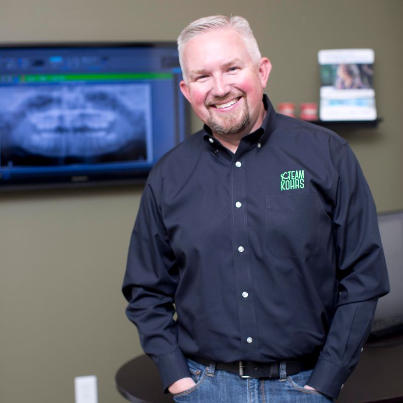 Dr. Kohrs, expert and top rated orthodontist, posing near The Dam in Aurora, Colorado