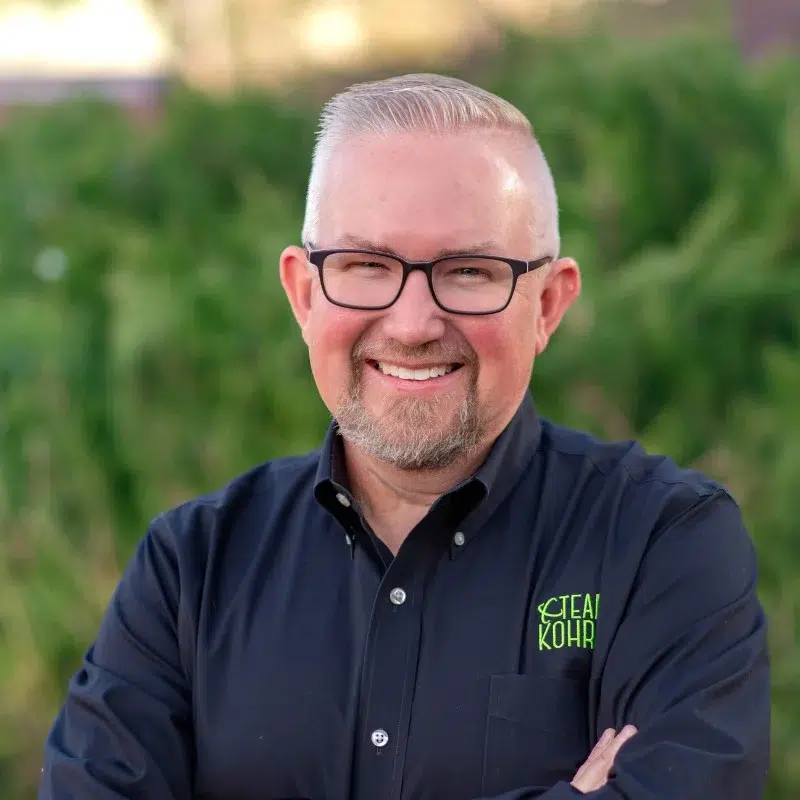 Kohrs-orthodontics-team-headshots-dr-kohrs Dr kohrs orthodontist smiling in professional headshot representing kohrs orthodontics expert orthodontic care