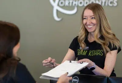 Introducing our new orthodontic office in bennett co 3 Kohrs team member interacting with a patient, representing new orthodontic office in bennett co