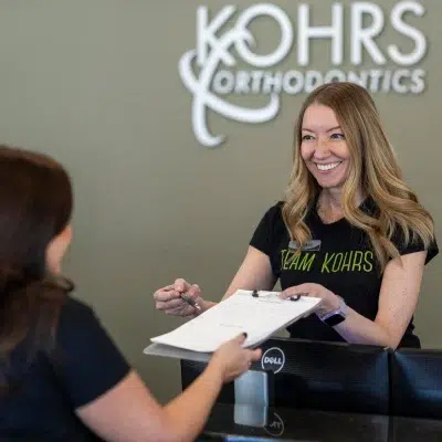 Introducing our new orthodontic office in bennett co 3 Kohrs team member interacting with a patient, representing new orthodontic office in bennett co