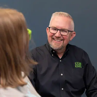 What to expect at your first orthodontist consultation 4 Dr. Kohrs meeting with a patient, representing your first orthodontist consultation
