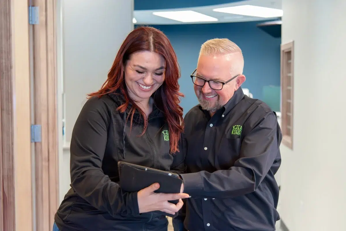 Kohrs-orthodontics-aurora-east-team Kohrs orthodontics team reviewing clear braces treatment planning in aurora, bennett, and strasburg, co, with expert, top-rated orthodontic care in metro denver