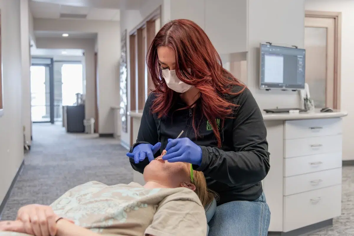 Kohrs-orthodontics-braces-treatment-process Kohrs orthodontics team member providing braces and clear braces treatment in aurora, bennett, and strasburg, co, with expert, top-rated orthodontic care