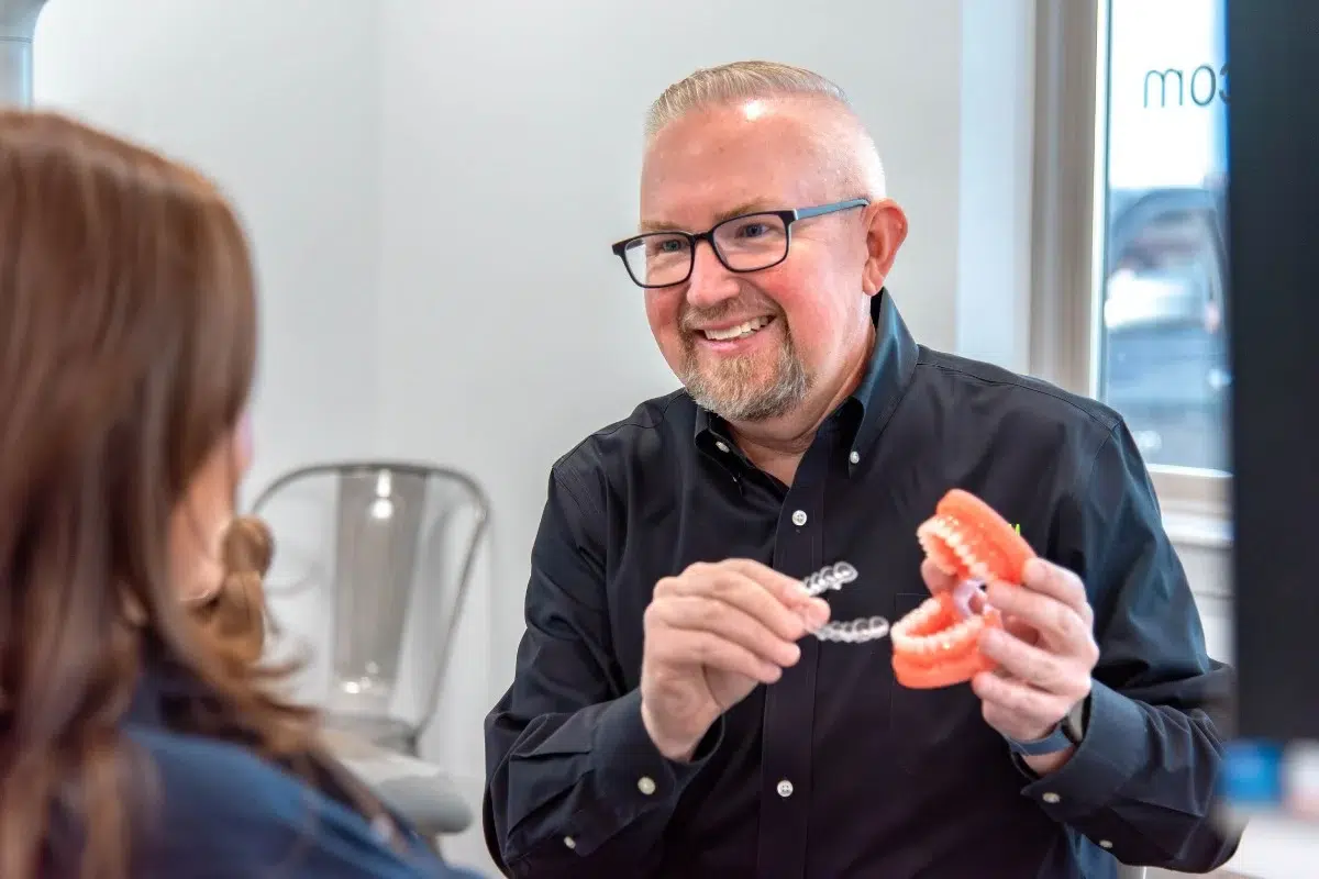 Kohrs-orthodontics-dr-kohrs-clear-aligners Expert orthodontist discussing clear aligner treatment at kohrs orthodontics in aurora, bennett, and strasburg, co, offering top-rated metro denver orthodontic care