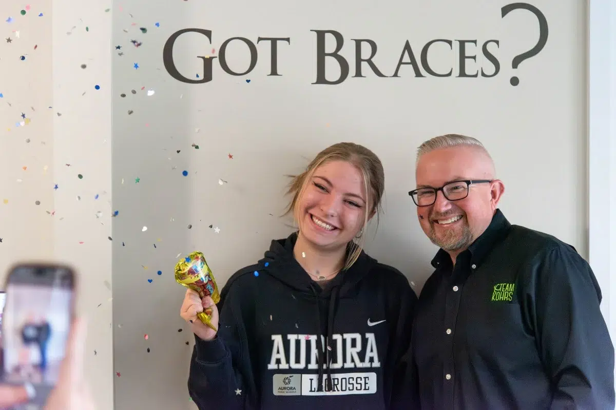 Kohrs-orthodontics-near-meadow-hills Kohrs orthodontics patient celebrating braces treatment in aurora, bennett, and strasburg, co, with an expert, top-rated orthodontist near meadow hills